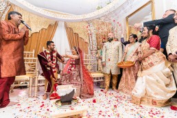 Hindu wedding games where the couple race to sit down first and take control of the marriage