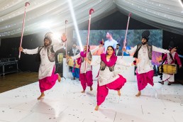 Bangra dancers entertain the guests at Lee and Sonia's wedding